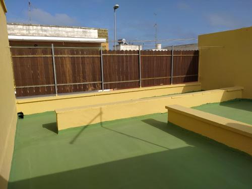 an empty balcony with a fence on a building at Casa Vacanze da Antonio in Torre Lapillo