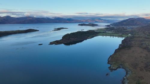 an aerial view of a large body of water at Coachmans Bothy - 50m from the beach in Port Appin