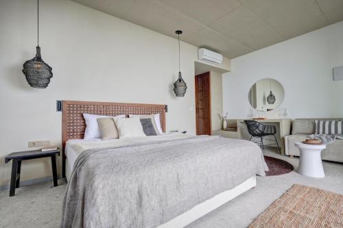Ένα ή περισσότερα κρεβάτια σε δωμάτιο στο Umani Hotel - Free Beach - Free Parking