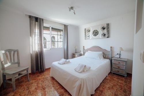 Giường trong phòng chung tại Villa Benicuco 24 - PlusHolidays