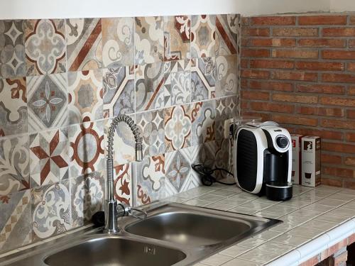 Una cocina o zona de cocina en La Dimora di Eloisa