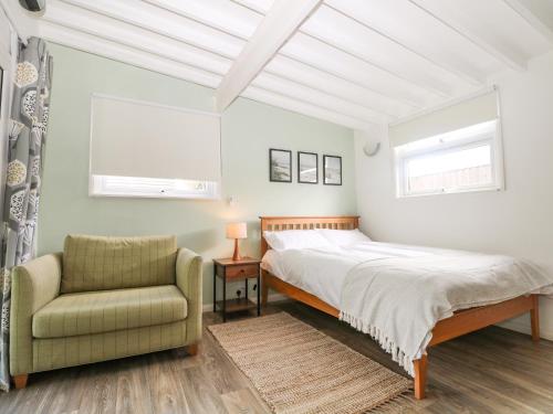 Un pat sau paturi într-o cameră la Wheatlands