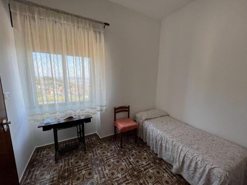 Cama o camas de una habitación en La Dimora di Eloisa