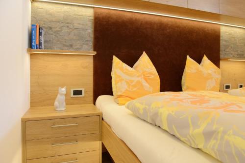 Postel nebo postele na pokoji v ubytování Apartments Mujnei