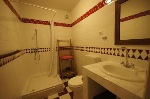 a bathroom with a sink and a toilet and a shower at Apartment in Vodice with sea view, terrace, air conditioning, WiFi 144-1 in Vodice