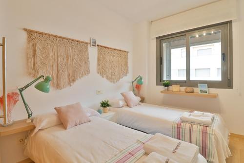 Postel nebo postele na pokoji v ubytování C13 Seaside Málaga with pool and parking