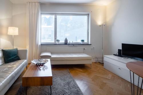 Stockholm Checkin Apartment Alvikにあるシーティングエリア
