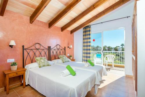 A bed or beds in a room at VILLA CAMPETS