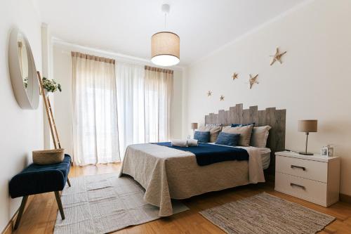 Postel nebo postele na pokoji v ubytování Baleal Beachfront Apartment