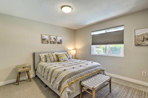 a bedroom with a bed and a window at 3 Mi to ASU! Snowbird Poolside Escape in Tempe in Tempe