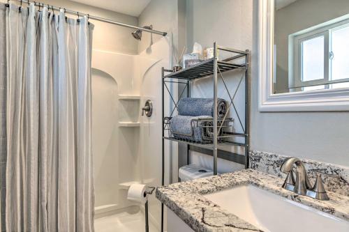 a bathroom with a sink and a shower at 3 Mi to ASU! Snowbird Poolside Escape in Tempe in Tempe