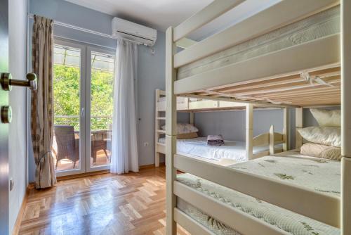Postel nebo postele na pokoji v ubytování Apartments Danigo