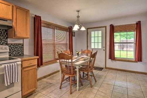 a kitchen with a dining room table and chairs at Table Rock Lake Retreat Less Than 1 Mi to Boat Launch in Golden