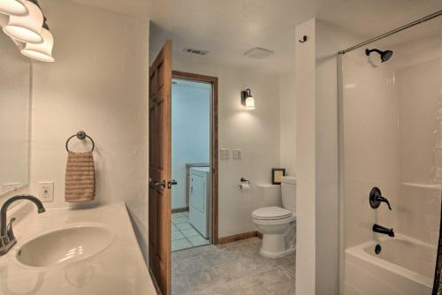 a bathroom with a sink and a toilet at Table Rock Lake Retreat Less Than 1 Mi to Boat Launch in Golden