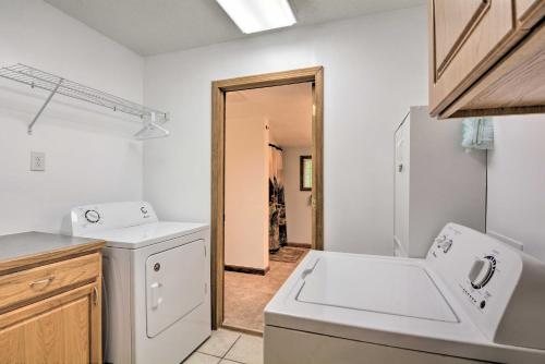 a laundry room with a washer and dryer at Table Rock Lake Retreat Less Than 1 Mi to Boat Launch in Golden
