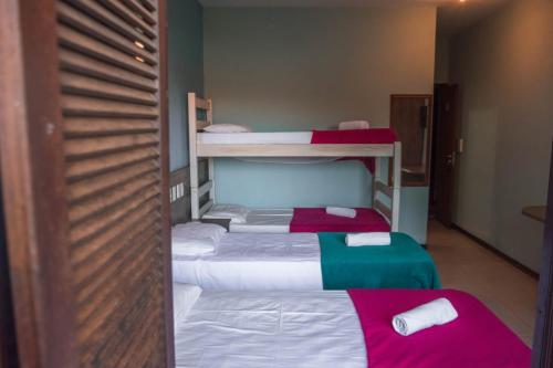 Un ou plusieurs lits superposés dans un hébergement de l'établissement Hotel Pousada Capão