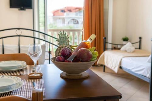 a bowl of fruit on a table in a room at Sunny Aprt at Klelia Cottage in Zakynthos Town