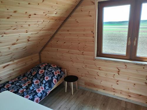 Katil atau katil-katil dalam bilik di Domek u Lipków na Kaszubach "Oliś" JACUZZI