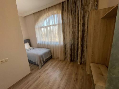  Harmonia Garden Garni -  Room  picture :   Tea/Coffee maker    Shower    Air conditioning                           