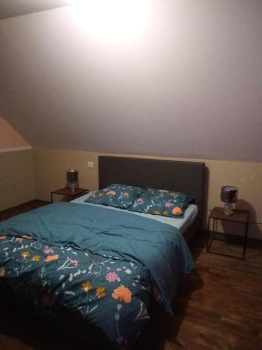 Posteľ alebo postele v izbe v ubytovaní APPARTEMENT