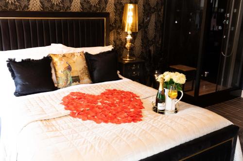 Krevet ili kreveti u jedinici u okviru objekta All Seasons Boutique Hotels