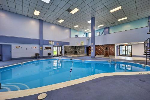 a large swimming pool in a large building at 2 Mi to Skiing! Beech Mtn Condo with Resort Perks in Beech Mountain