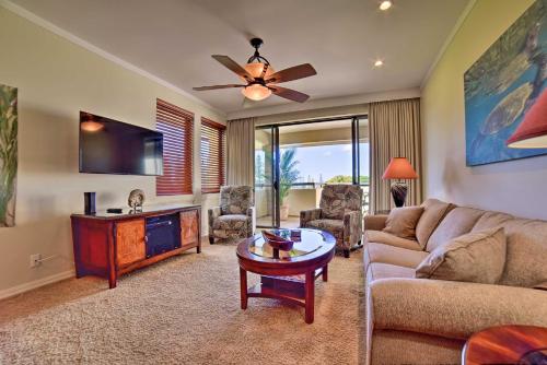 a living room with a couch and a table at Kapalua Extraordinaire with Glorious Ocean Views! in Kahana
