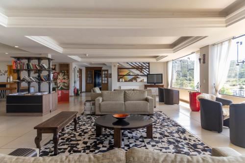 Uma área de estar em Cambará Eco Hotel