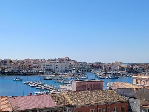 a view of a harbor with boats in the water at Casa Ciuzza in Siracusa