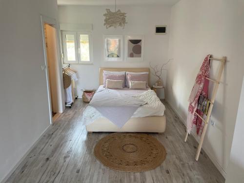 Posteľ alebo postele v izbe v ubytovaní Apartman David 73