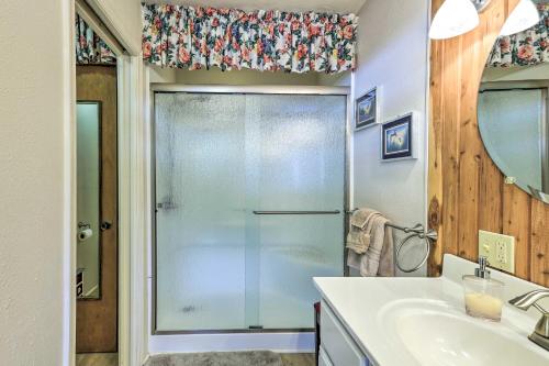 a bathroom with a shower and a sink at Charming Abode with Dock on the Suwannee River in Bell