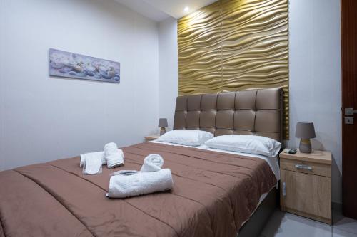 Sea Kiato Apartmentにあるベッド