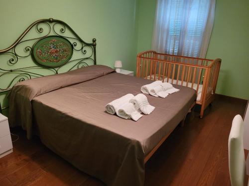 Posteľ alebo postele v izbe v ubytovaní Pisicchio Rooms