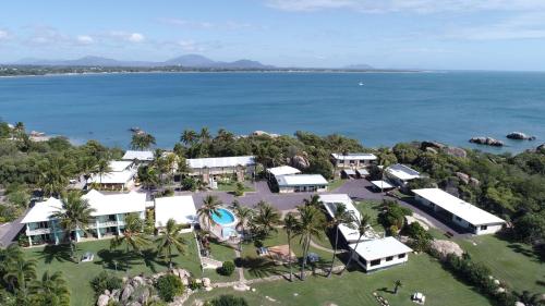 an aerial view of the resort and the water at Whitsunday Sands Resort in Bowen
