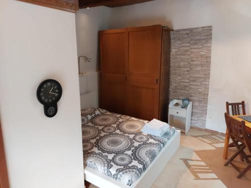 Säng eller sängar i ett rum på Casa Vittoria