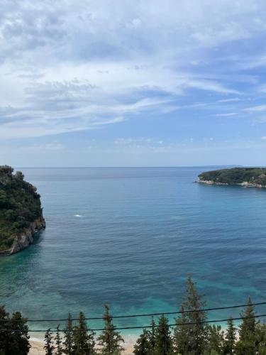 a view of the ocean from a bluff at Palatino Hotel in Parga
