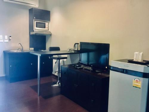 Kuchyň nebo kuchyňský kout v ubytování The Desiign Hotel - SHA