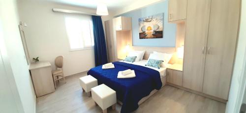 Postel nebo postele na pokoji v ubytování The Central Residence - Kassiopi Corfu Villas