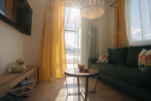 Zona de estar de Forellenhof Appartements & Grossmutters Bungalow