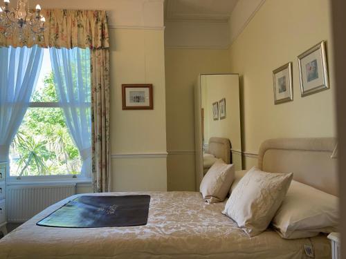 Postel nebo postele na pokoji v ubytování The Daylesford Guest House