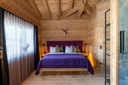 Posteľ alebo postele v izbe v ubytovaní Mountain Chalet R