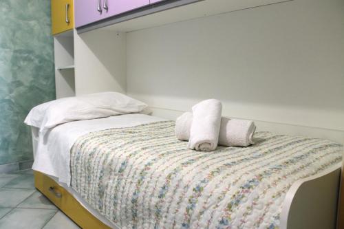 Un ou plusieurs lits dans un hébergement de l'établissement L'Arlesiana
