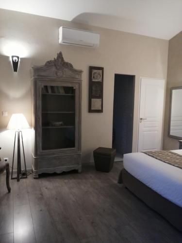Postel nebo postele na pokoji v ubytování Chambres d'hôtes Le Mas de Molines