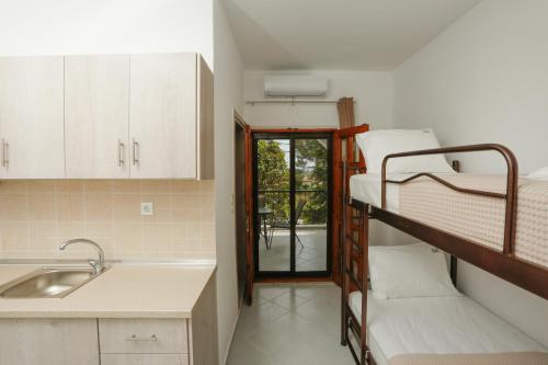 Ένα ή περισσότερα κρεβάτια σε δωμάτιο στο GK Houses #1