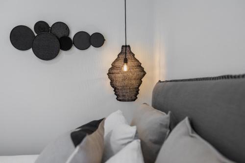 Katil atau katil-katil dalam bilik di Anemelia Luxury Apartments