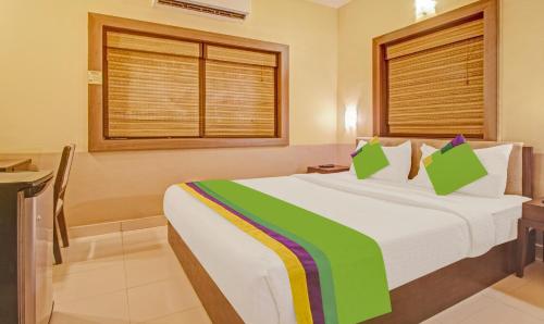 Postel nebo postele na pokoji v ubytování IKIGAI Green Valley Beach Resort