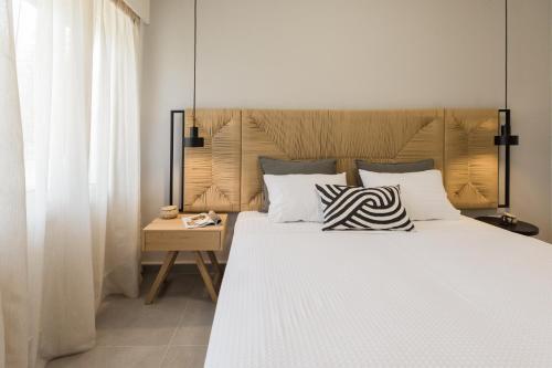 Katil atau katil-katil dalam bilik di Anemelia Luxury Apartments