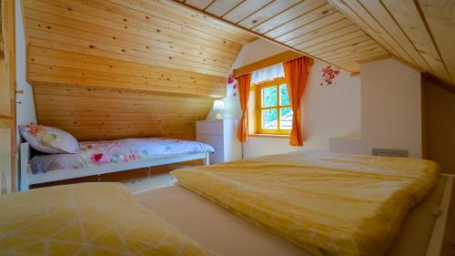 Posteľ alebo postele v izbe v ubytovaní Holiday House Pečišće
