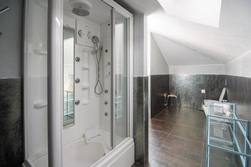 a bathroom with a shower and a sink at Magnificent Villa Sanremo in Sanremo