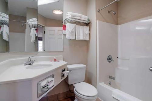 a bathroom with a toilet and a sink and a shower at Americas Best Value Inn Gettysburg in Gettysburg